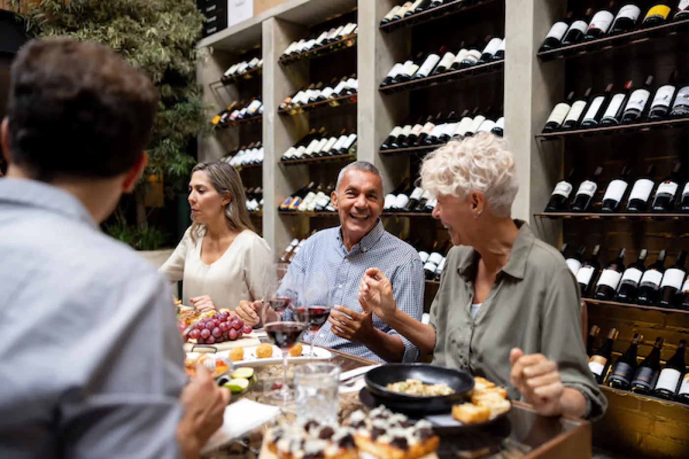 Good Life Abroad community members sharing a meal together