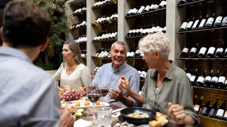Good Life Abroad community members sharing a meal together